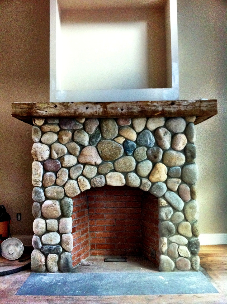 River Stone Veneer Fireplace